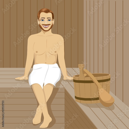Handsome man having sauna bath in steam room