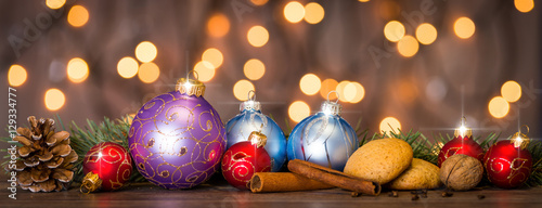 Christmas background with decorations on wooden board