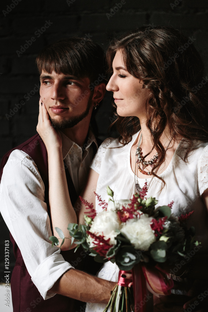 Wedding couple posing in the interior Wedding couple posing in the interior
