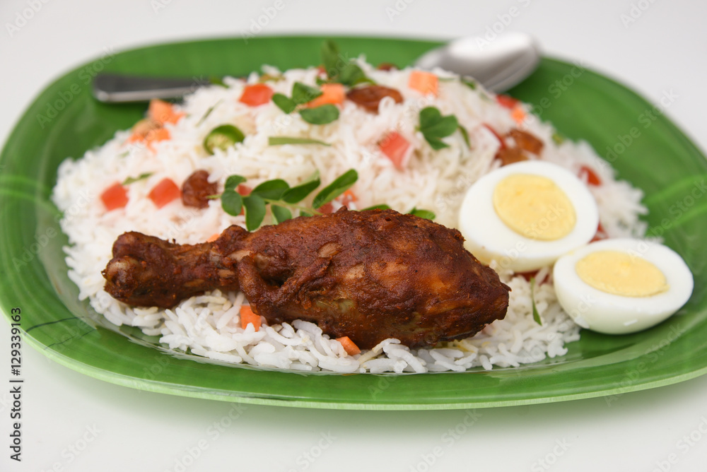 chicken biryani or biriyani made of basmati rice. hot spicy food very popular in Hyderabad India