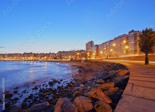 Uruguay, Montevideo, Twilight view of the Pocitos Coast on the River Plate. photo