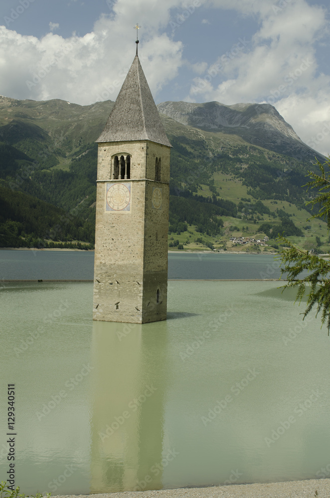 Italy, sunken church tower in Reschen Lake - Lago di Resia - in South Tyrol