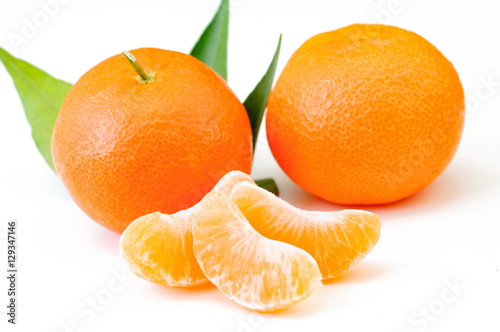 Mandarin citrus fruit on white background. Orange with leaf and