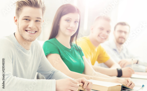 Young students studying at the lesson