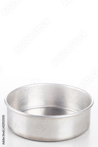 Metal pan for baking and cooking on white background.