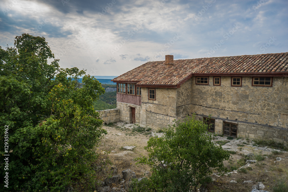 Old stone houses of the medieval town Chufut-Kale in the mountains Old stone houses of the medieval town Chufut-Kale in the mountains