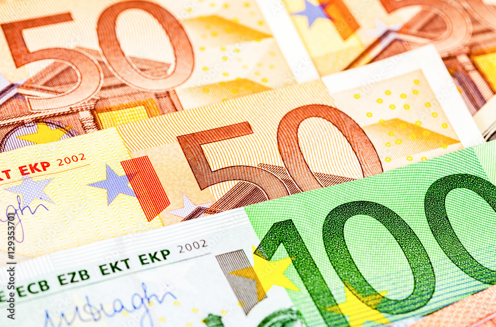 Background from different euro banknotes close up Background from different euro banknotes close up