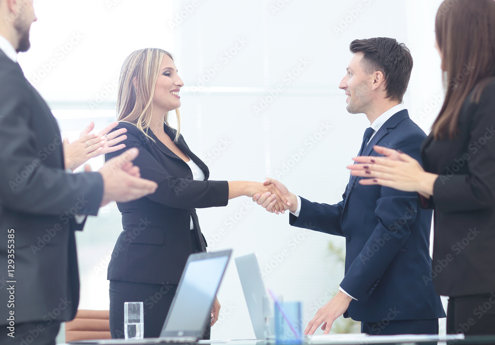 Business partner greeting each other with handshake Business partner greeting each other with handshake