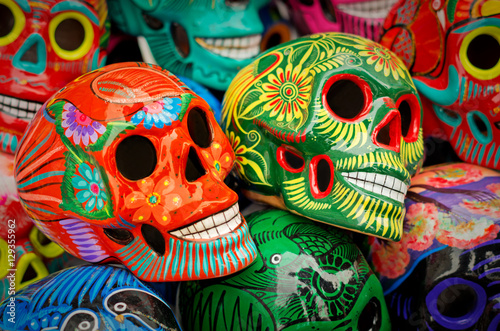 Decorated colorful skulls at market, day of dead, Mexico photo