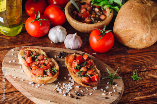 Two Bruschetta with Tomatoes and Ingredients