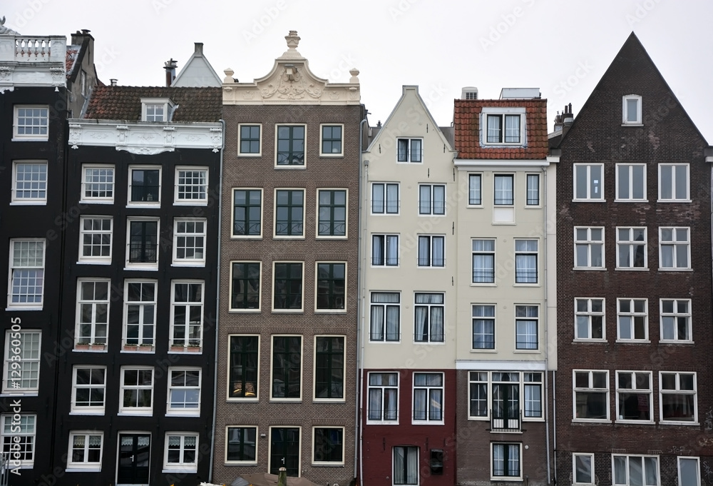 Row of very important mansions, located at the side of a canal, in Amsterdam