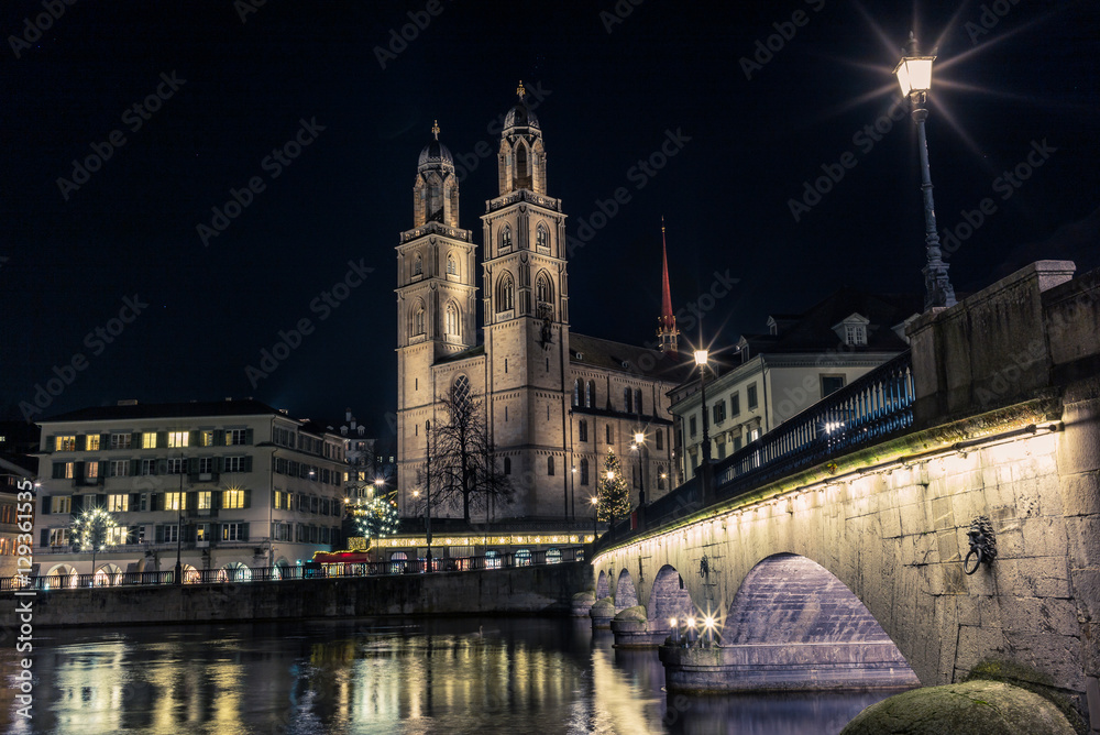 Fototapeta premium View of the Grossmunster cathedral in Zurich from the riverside