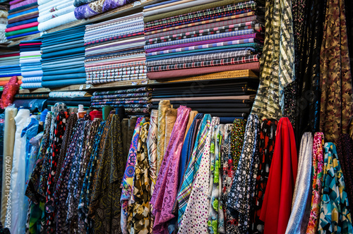 Textile store with different fabrics on bazaar in Kashan, Iran