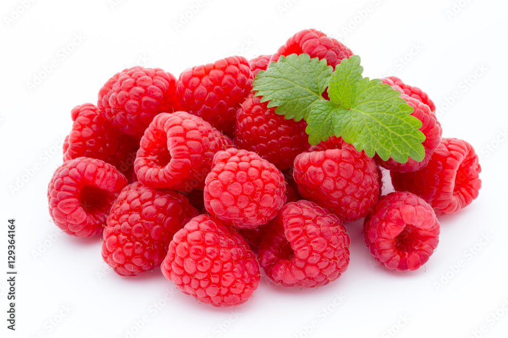Ripe red raspberries isolated on white background. Ripe red raspberries isolated on white background.