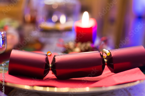 Red Christmas cracker on a plate