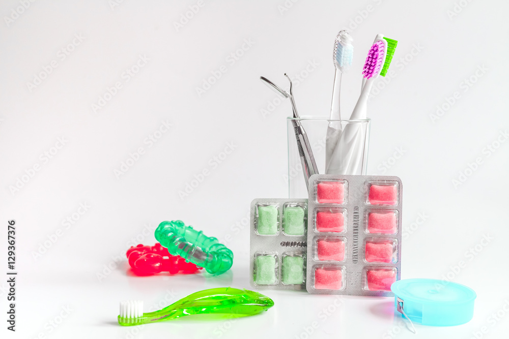 toothbrushes in glass on white background tools for oral care toothbrushes in glass on white background tools for oral care