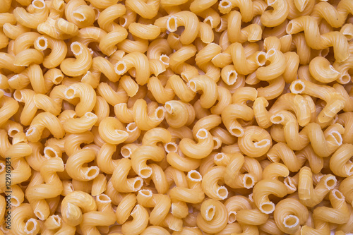 Pasta, macaroni horns background, texture