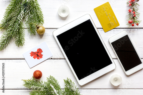 smartphone, tablet, shopping for new year online wooden table © 279photo