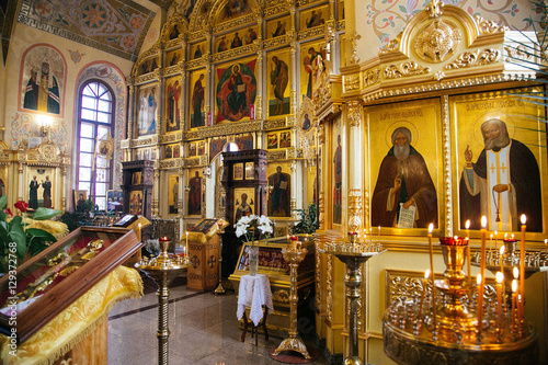 candles and icon in russian church altar