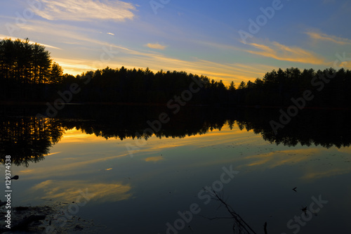Fototapeta Naklejka Na Ścianę i Meble -  Sunset on a forest lake.