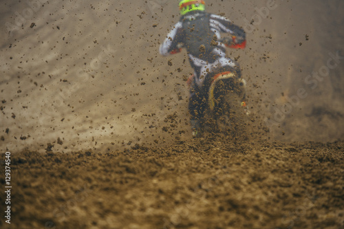 Motocross motorbike sprinkling mud