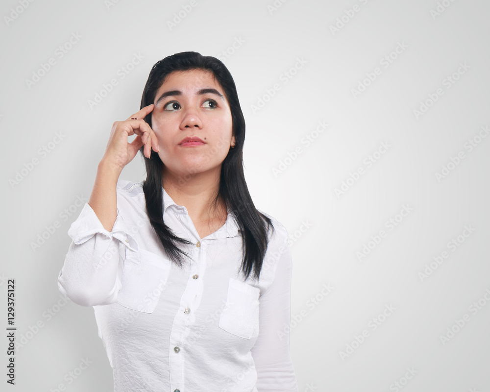 Young Asian Businesswoman Thinking Young Asian Businesswoman Thinking
