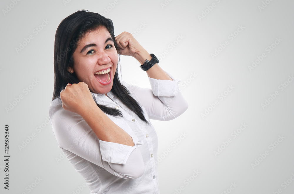 Young Asian Businesswoman Showing Winning Gesture Young Asian Businesswoman Showing Winning Gesture