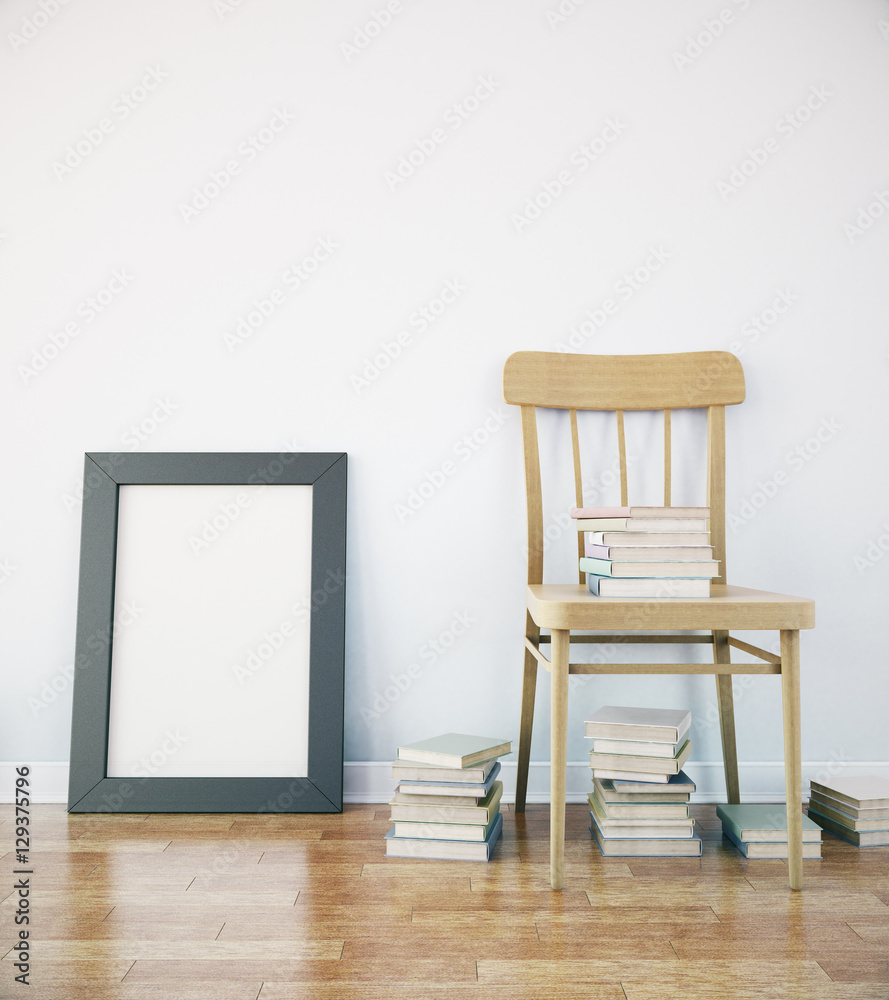 Fototapeta premium Chair and blank picture frame