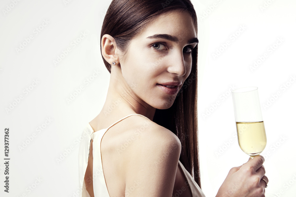Young woman with long hair celebrating with champagne. Flares. Party, New Year, Christmas concept Young woman with long hair celebrating with champagne. Flares. Party, New Year, Christmas concept