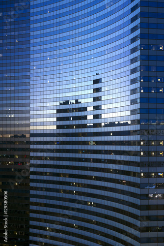 Modern steel and glass facade of an office building
