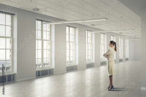 Fotografija Businesswoman in her office . Mixed media