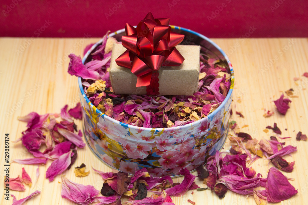 boxes with gifts with rose petals,concept for Valentines day, anniversary, romantic gift. boxes with gifts with rose petals,concept for Valentines day, anniversary, romantic gift.