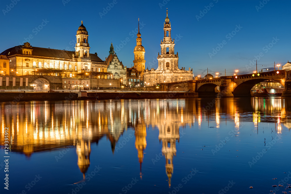 Hofkirche and palace at the river Elbe in Dresden at night