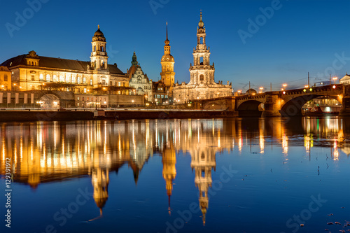 Hofkirche and palace at the river Elbe in Dresden at night © elxeneize