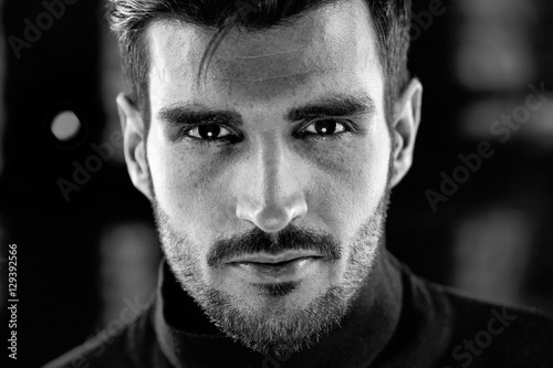 Black and white photo of handsome man