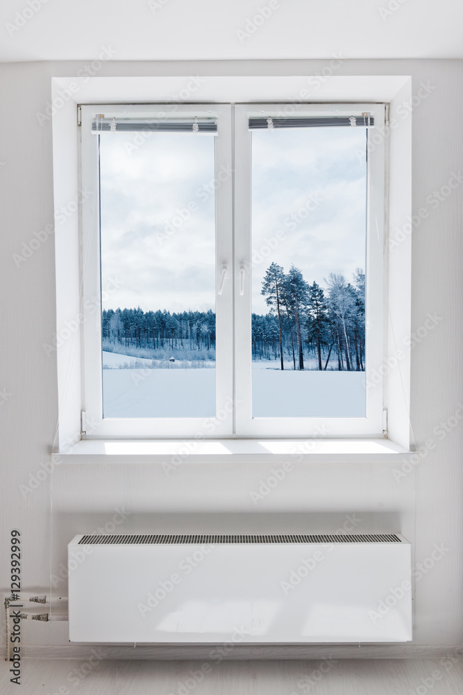 Winter landscape seen through the window Winter landscape seen through the window
