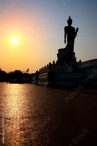 beautiful landscape silhouette buddha statue sacred with sunset