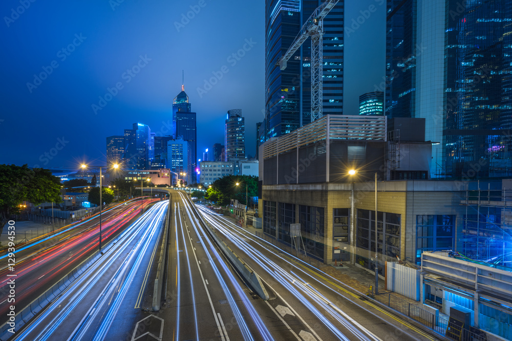 Fototapeta premium Traffic light trails in downtown of Hong Kong,China.