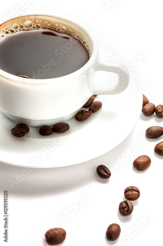 Coffee cup with beans isolated on white