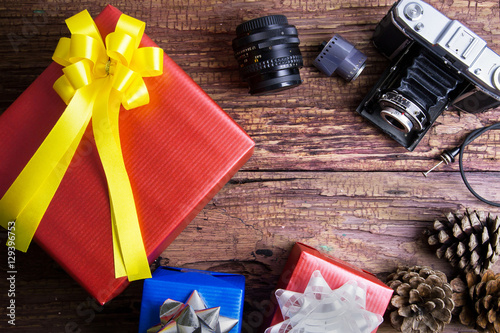 Present gift box design wrapped in color paper with bows and vin photo