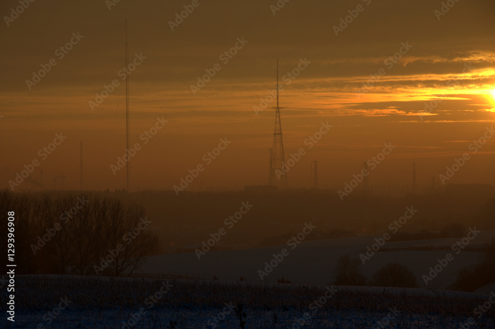 Sunrise over snow covered fields in Belgium