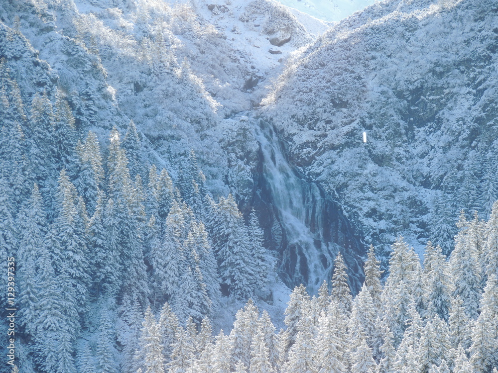 Fototapeta Winter mountain waterfall