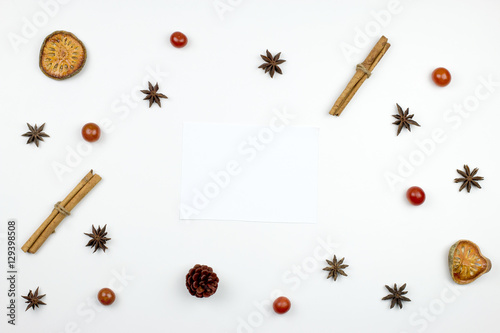 Flat lay of white paper with copy space on white background. Winter concept. Top view.