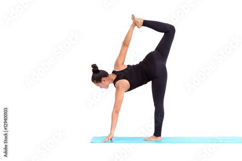 Beautiful Asian woman practicing yoga pose on white background