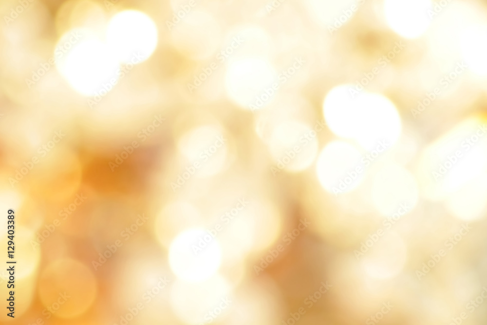 Obraz premium Abstrakcjonistyczny złoty bokeh tło