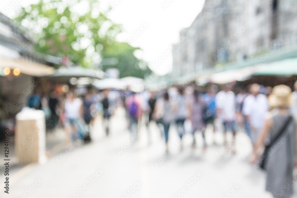 Blurred image of people walking at market Blurred image of people walking at market