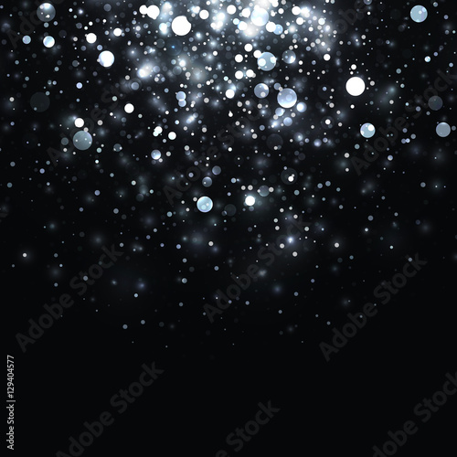 Vector silver glowing light glitter background. Christmas white magic lights background. Star burst with sparkles on black background