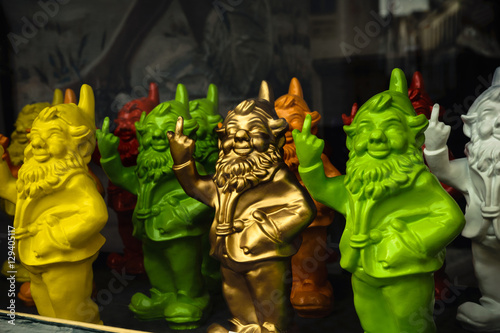 Gnomes showing middle finger in the store window in Bruges, Belgium photo