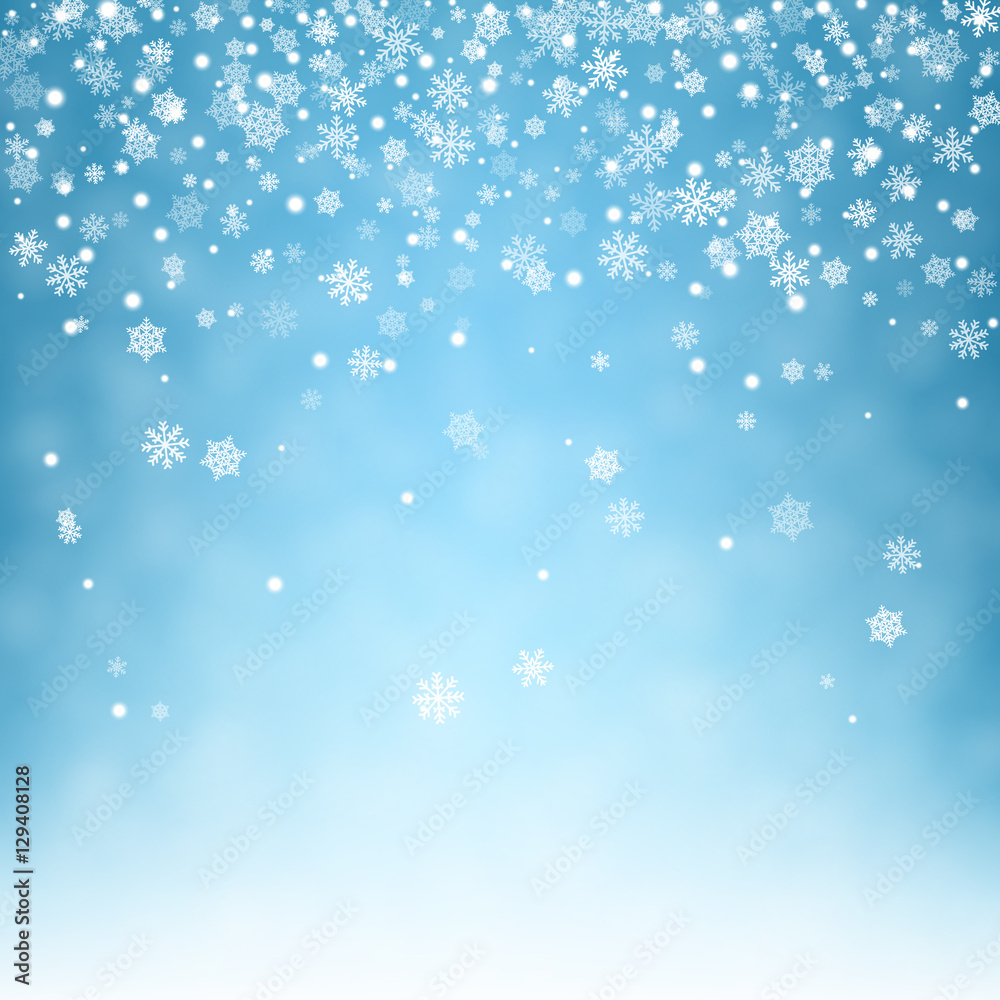 Flying snowflakes on blue background.