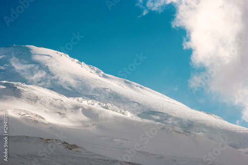 Elbrus Mountain glacier Landscape Travel serene scenic view blue sky and clouds © EVERST